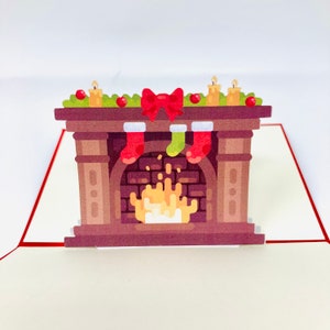 Carte de Noël pop-up 3D avec cheminée de Noël lumineuse