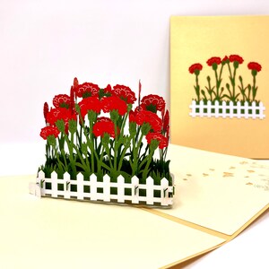 Tarjeta emergente hecha a mano 3D con parche de flor de clavel rojo