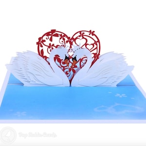 Tarjeta emergente hecha a mano 3D de hermosa pareja de cisnes
