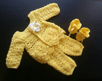 newborn baby yellow clothes