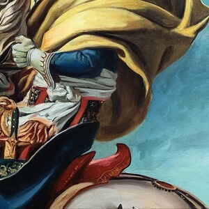 May include: A painting of a person riding a horse. The person is wearing a yellow cloak and a blue and white tunic. The horse is brown and white.