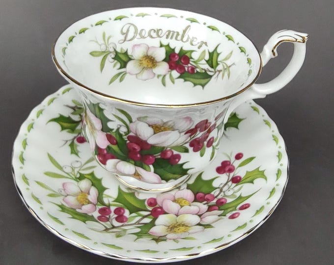 Featured listing image: Royal Albert December Christmas Rose Tea Cup And Saucer Flower Of The Month Fine Bone China England