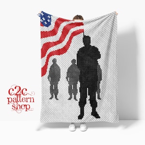 May include: A white crochet blanket with a red, white, and blue American flag and silhouettes of soldiers. The text "C2C pattern shop" is in the lower left corner.