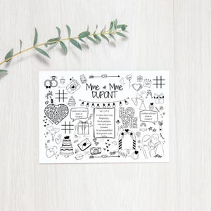 Op de afbeelding: Een zwart-witte printbare bruiloftsactiviteitenpagina met de tekst "Mme & Mme DUPONT" en verschillende bruiloftsafbeeldingen, waaronder harten, ringen, cadeaus en een doolhof.