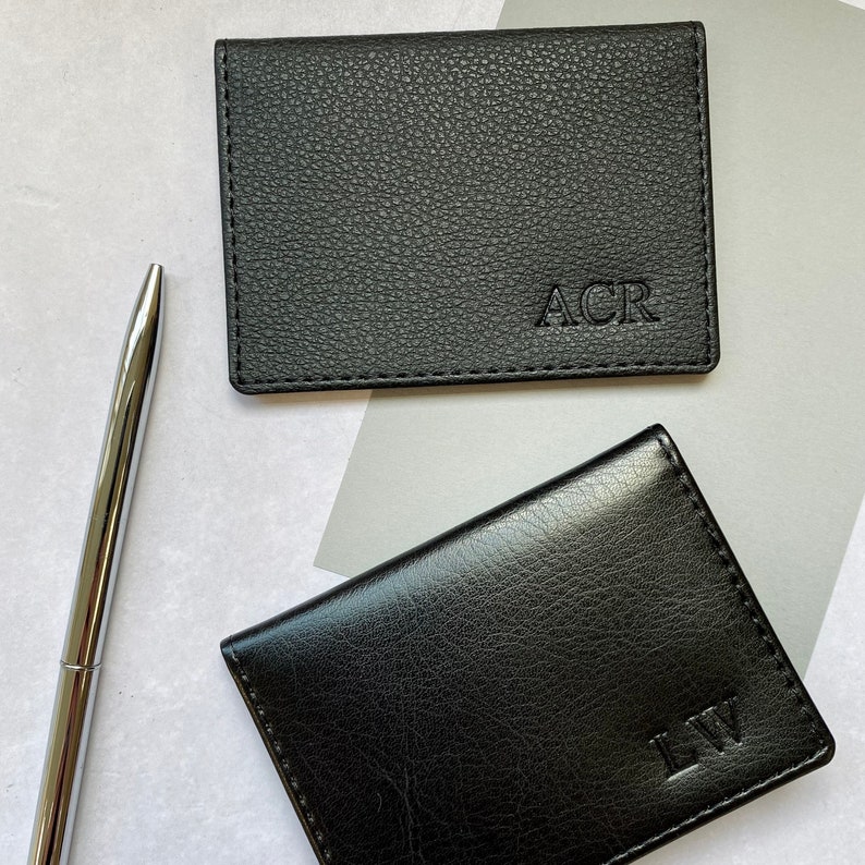 Small black card holders in vegan leather, personalised with initials in the bottom right corner