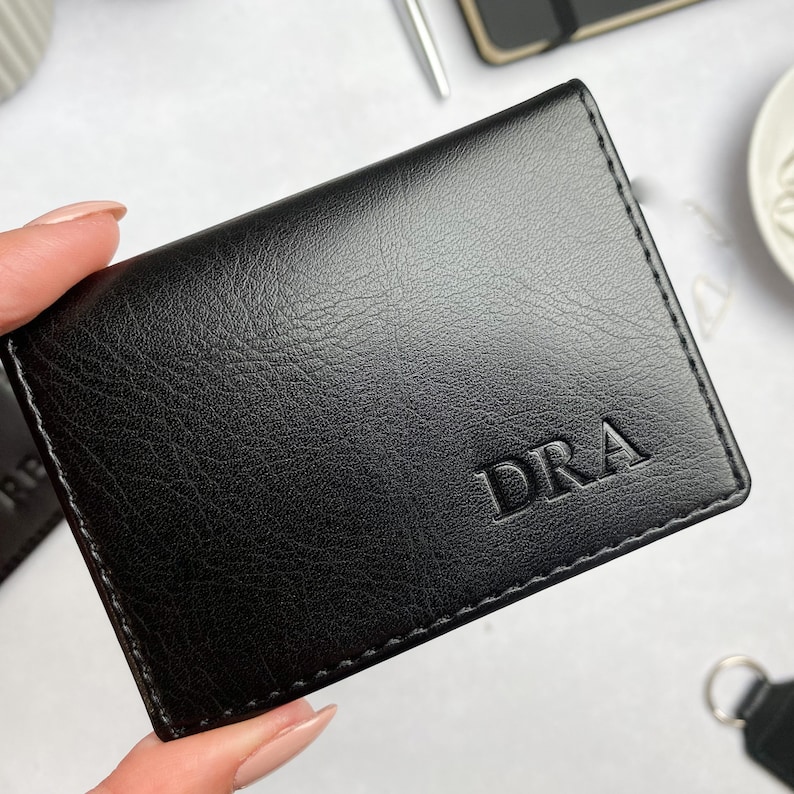 Small black card holder in a smooth vegan leather, personalised with initials in the bottom right corner
