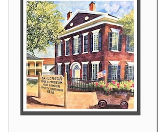 May include: Watercolor painting of the Dahlonega Gold Museum, Old Lumpkin County Courthouse, 1836. The building is red brick with black shutters and a white trim. A sign in front of the building displays the museum's name. The painting is 10 inches square.