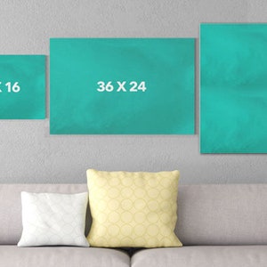 May include: Four teal canvas prints of different sizes hanging on a wall. The prints have white text on them indicating the dimensions of each print. The dimensions are 18 x 12 inches, 24 x 16 inches, 36 x 24 inches, and 48 x 32 inches.