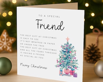 May include: A white greeting card with the text TO A SPECIAL Friend and a poem about Christmas friendship. The card features a watercolour illustration of a decorated Christmas tree with colourful ornaments and wrapped gifts at the base.