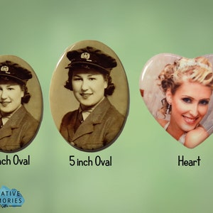 May include: Three different sizes of photo keepsakes. A 4 inch oval, a 5 inch oval, and a heart shaped keepsake. The ovals feature a black and white photo of a woman in a military uniform. The heart shaped keepsake features a colour photo of a woman in a wedding dress.