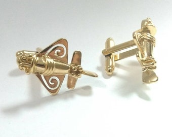 Quimbaya airplane gold plated cufflinks offer.