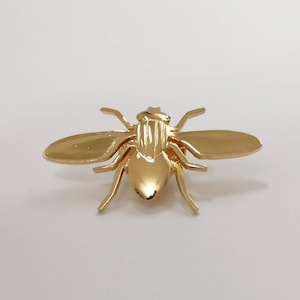 Egyptian fly gold plated brass pin.