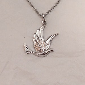 Seeking peace dove pendant