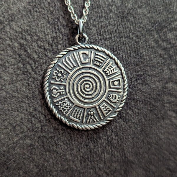 Pachamama pendant, brass with silver plated stainless steel chain.