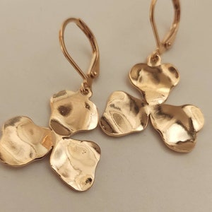 Golden clover gold plated natural brass earrings.