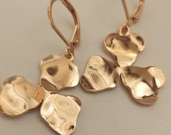 Golden clover gold plated natural brass earrings.