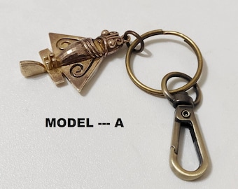 Quimbaya airplane keychain. 2 models, Gold flyer ancestral.