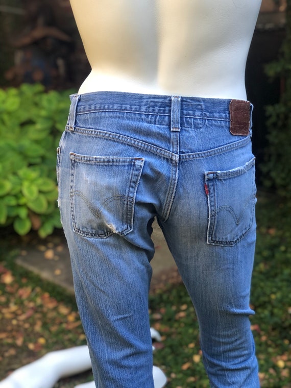 Levi 514 top ripped jeans