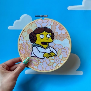 RALPH - Arte mural con bastidor de bordado floral de Los Simpsons