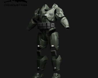 Könnte beinhalten: Ein zerlegter grüner und grauer Roboteranzug im Militärstil. Der Anzug besteht aus einem Torso, Armen, Beinen und Füßen. Der Anzug steht auf einem schwarzen Hintergrund.