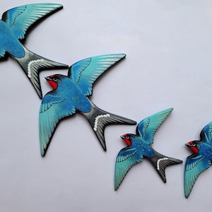 Set of 4 ceramic flying swallows 2 small 2 regular