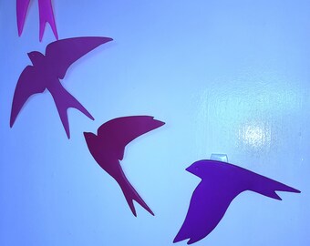 Set of 4 ceramic swallow silhouette wall plaques