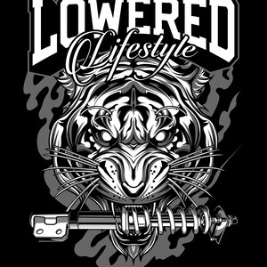 May include: Black and white graphic featuring a tiger's head with a suspension component in its mouth. The text "LOWERED Lifestyle" is displayed above the tiger's head in a bold, blocky font, with "Lifestyle" in a script font.