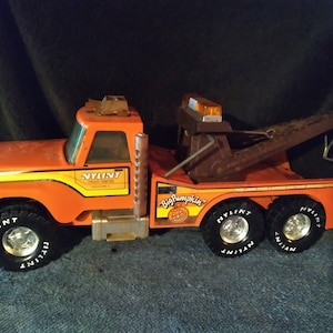 Vintage NYLINT Big Pumpkin Tow Truck - Wrecker Orange - Pressed