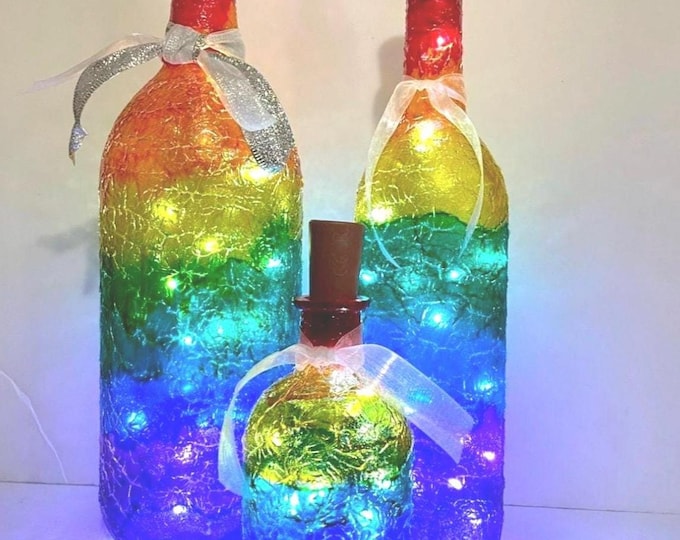 Rainbow Lighted bottles. Rainbow theme bottles with lights. Rainbow light up bottles with fairy lights. Unique Mother’s Day gift idea