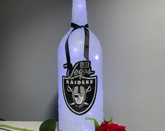 Las Vegas Raiders lighted bottles. Las Vegas Raiders gifts. LV Raiders light up bottles. LV Raiders wine bottles