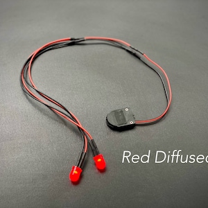 10mm Red, Blue, & Green LED Glowing Eyes for Cosplay and Props Diffused and Clear Runs on 3 Volt 2032 Battery
