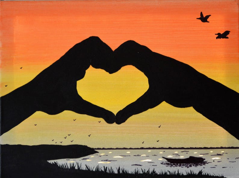 Led canvas art 'Hands in heart on sunset' image 1