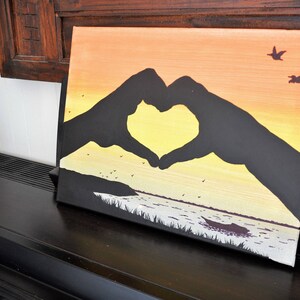 Led canvas art 'Hands in heart on sunset' image 5