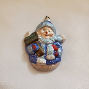 A Miniature Snowman Tree Ornament.