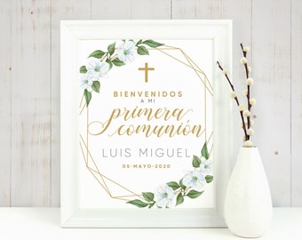 May include: A white framed printable sign with a gold geometric frame and white flowers. The text reads "Bienvenidos a mi Primera Comunión Luis Miguel 05-Mayo-2020".
