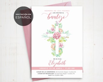 May include: A white card with pink and green watercolor floral designs surrounding a white cross. The text "INVITACIÓN EN ESPAÑOL" is in the top left corner. The text "NOMBRE DE LOS PADRES LOS INVITAN AL bautizo DE SU HIJA Elizabeth SÁBADO 23 DE ABRIL 11:00 AM LUGAR DE LA CEREMONIA 123 Avenida alegre Cuidad, ES LUGAR DE RECEPCION 123 Avenida alegre Cuidad, ES RSVP Mio (322)816-0884 berryprettypaper.etsy.com" is printed on the card.