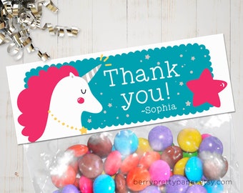 May include: A teal blue thank you tag with a white unicorn and pink mane, a pink star, and silver glitter stars. The tag says "Thank you! -Sophia".