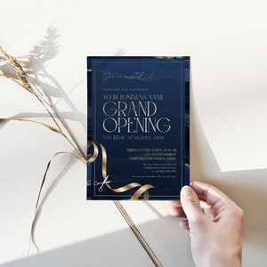 Modern navy and gold business invitation template for grand openings and corporate parties.