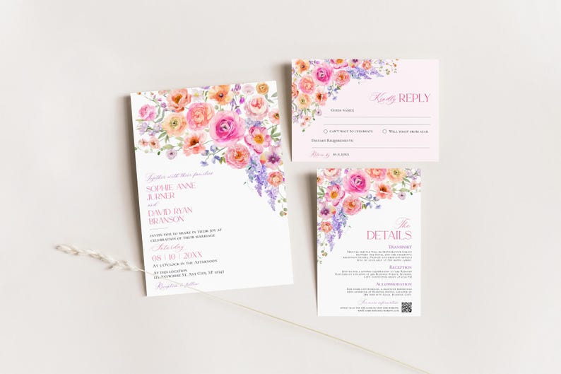 May include: A wedding invitation suite featuring a main invitation, a reply card, and a details card. Each piece is decorated with watercolor floral illustrations in shades of pink, orange, and purple, with printed text in a pink serif font.