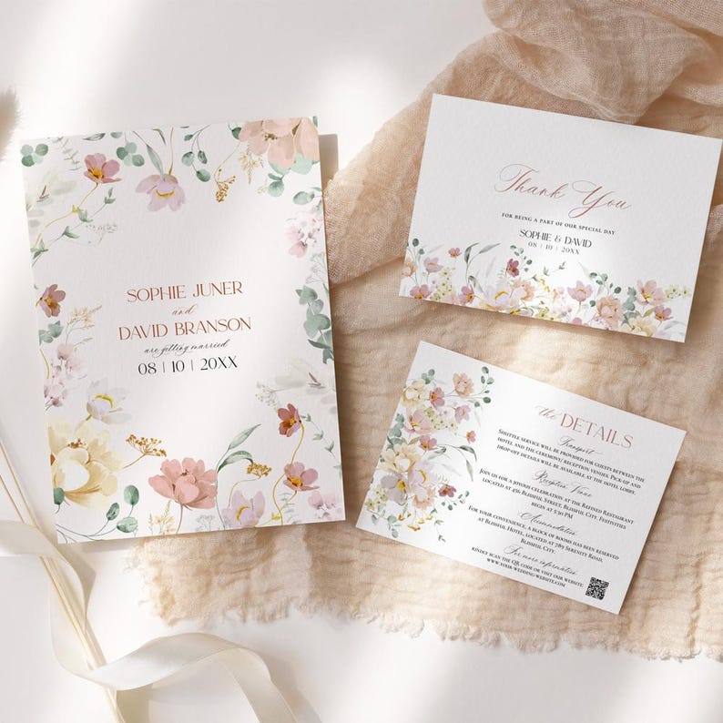 May include: Wedding invitation suite with a floral design. The invitation features a watercolor floral border with pink, white, and yellow flowers. The text reads "Sophie Juner and David Branson are getting married 08/10/20XX". The thank you card features a similar floral design and the text "Thank You for being a part of our special day Sophie & David 08.10.20XX". The details card features a floral design and the text "The Details".