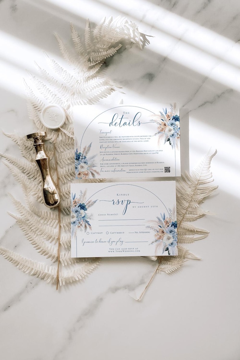 May include: A wedding invitation suite with a blue and white floral design. The invitation card has the text "The Details" and includes information about the ceremony and reception. The RSVP card has the text "Kindly RSVP by August 31st" and includes a space for guests to provide their names and indicate their attendance.