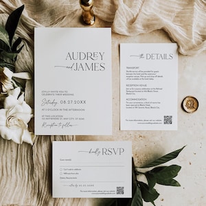 May include: Elegant wedding invitation suite featuring a main invitation, details card, and RSVP card. The design includes minimalist typography with the names "Audrey and James". The cards are white with black text, accented by a gold wax seal and a gold decorative element.