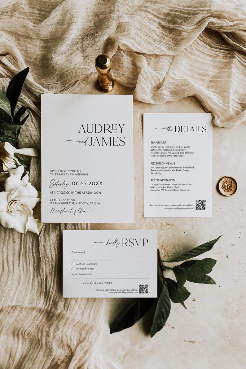 May include: Elegant wedding invitation suite featuring a main invitation, details card, and RSVP card. The design includes minimalist typography with the names "Audrey and James". The cards are white with black text, accented by a gold wax seal and a gold decorative element.