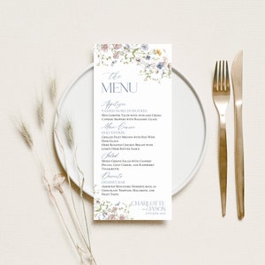 May include: A wedding menu with a floral design. The menu includes appetizers, main courses, salad, and desserts. The text at the bottom of the menu reads "Charlotte & Jason 22nd June 2023".
