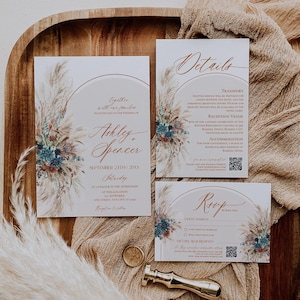Peut inclure: Ensemble de faire-part de mariage comprenant une invitation principale, une carte de détails et une carte de réponse. Le design comprend des accents floraux, une palette de couleurs neutres et une écriture élégante.