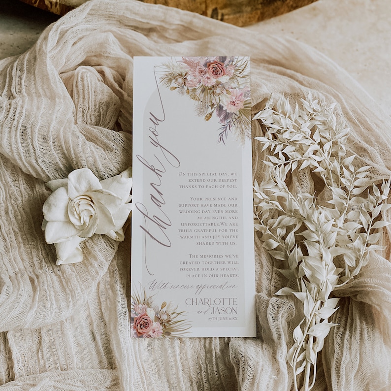 May include: A thank you card with a floral design and the text "Thank you" in a script font. The card also includes the text "On this special day, we extend our deepest thanks to each of you." and "Your presence and support have made our wedding day even more meaningful and unforgettable. We are truly grateful for the warmth and joy you've shared with us."