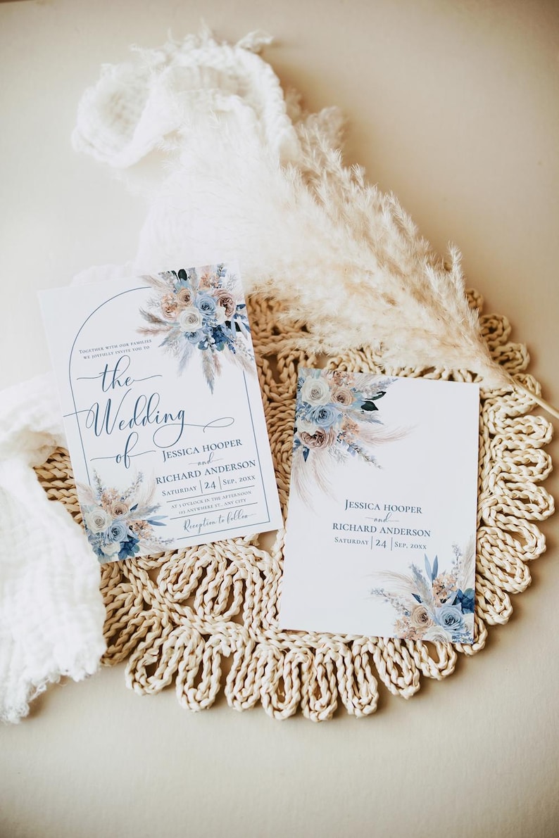 May include: Two wedding invitations with a floral design in shades of blue and beige. The text on the invitations reads "the wedding of Jessica Hooper and Richard Anderson" and "Saturday 24 Sep, 20xx".