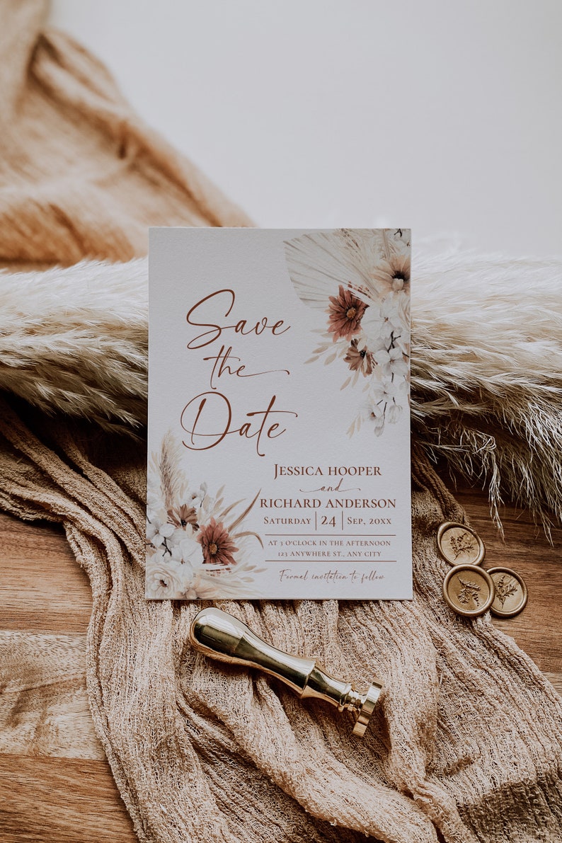 May include: A rectangular Save the Date card featuring floral illustrations in muted tones, the names Jessica Hooper and Richard Anderson, and event details. A gold wax seal stamp and three small wax seals are placed near the card.