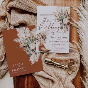 May include: A wedding invitation set featuring a white card and a terracotta card with pampas grass and cowboy boot illustrations. The text reads: The Wedding of Sarah William and Richard Anderson, Saturday 24 Sep, 20XX. Includes a gold wax seal stamp.