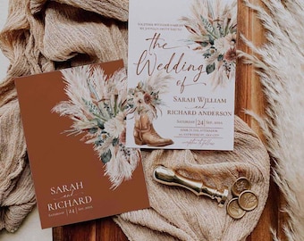 Könnte beinhalten: Ein Hochzeitseinladungsset mit einer weißen und einer terrakottafarbenen Karte, verziert mit Pampasgras und Cowboystiefeln. Der Text lautet: The Wedding of Sarah William and Richard Anderson, Saturday 24 Sep, 20XX. Enthält einen goldenen Wachssiegelstempel.